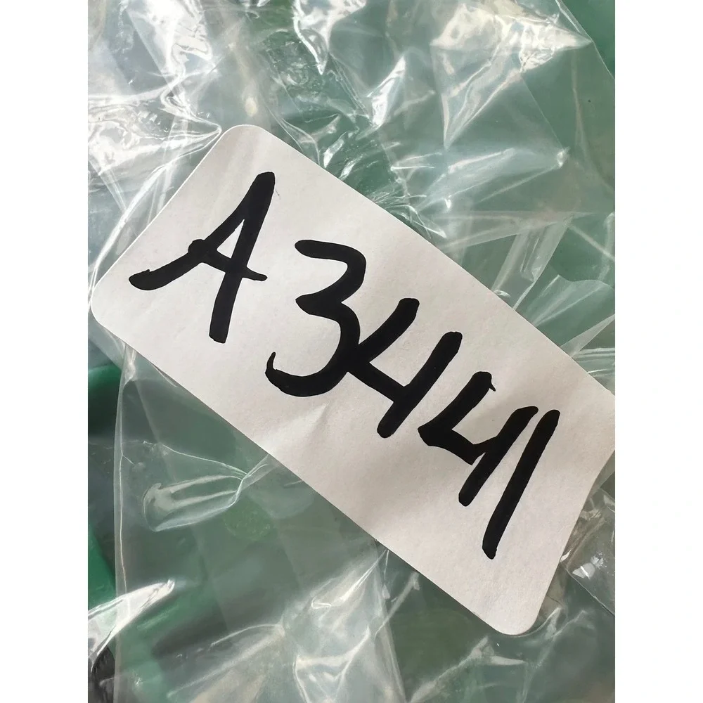 Green Plastic Round Storage Canister with Carrying Strap and Screw Lid